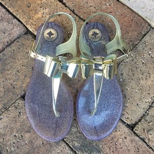 Gold bow BCBGeneration sandals
